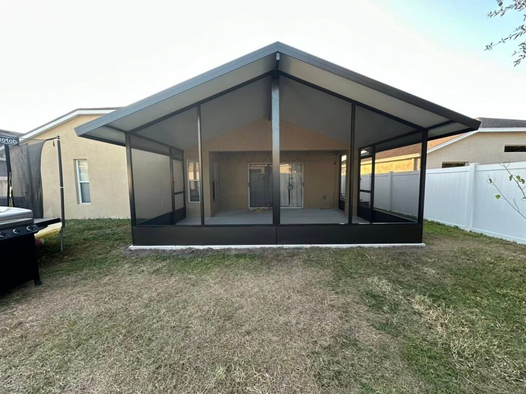 Lanai screen enclosure installation in Sanford, FL residential backyard patio